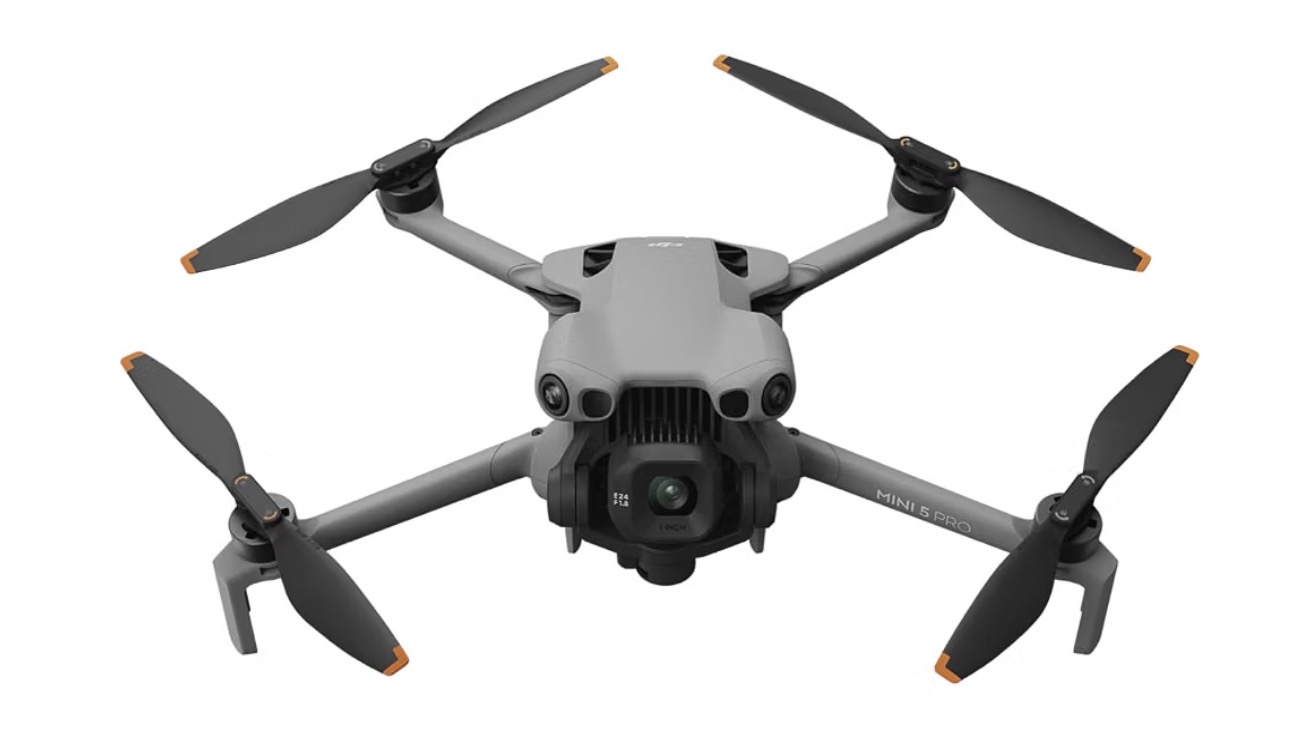 Owner-supplied DJI Mini 5 Pro reference image, showing the drone with its arms and propellers extended.